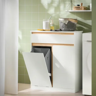 Meuble de salle de bain blanc avec panier à linge